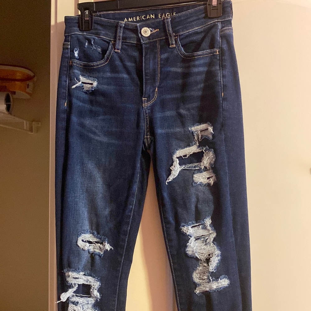 american eagle jeans with covered holes. women size 4